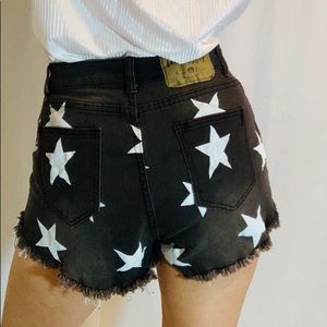 Star distressed shorts